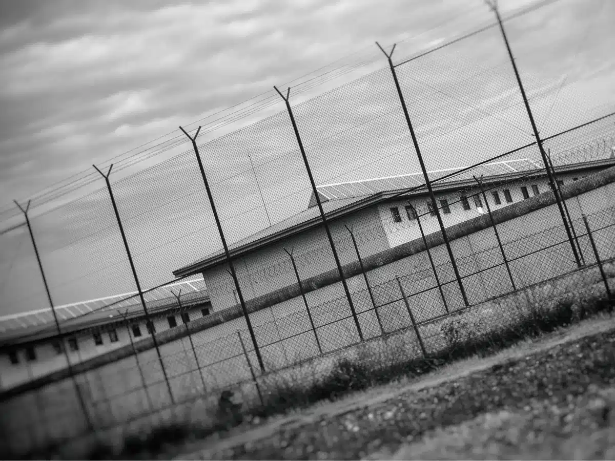 black and white image of a correctional facility