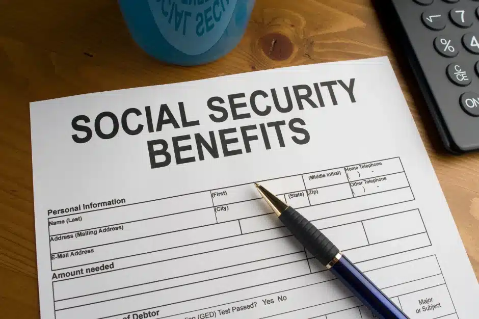 Signs you will be approved for social security disability benefits, image of social security benefits application on desk with pen, Disparti Law Group