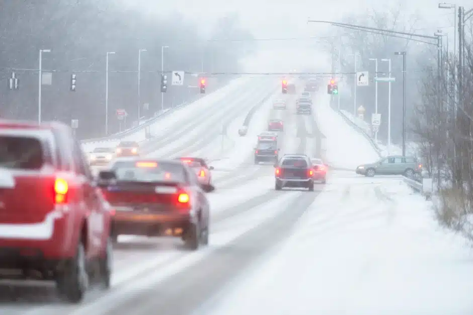 weather-related car accident, image of cars on road with snow, Disparti Law Group